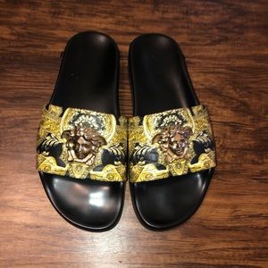 Medusa Hibiscus Slide Sandal
VERSACE